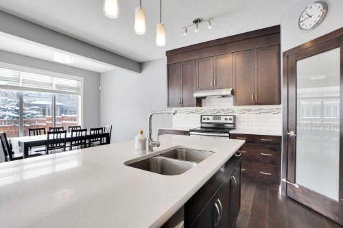 2 Aspen Summit Mount Sw, Calgary, AB - Indoor Photo Showing Kitchen With Double Sink