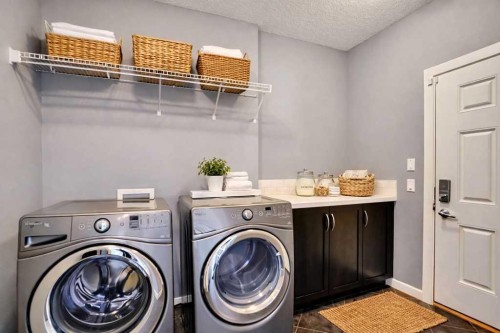 2 Aspen Summit Mount Sw, Calgary, AB - Indoor Photo Showing Laundry Room