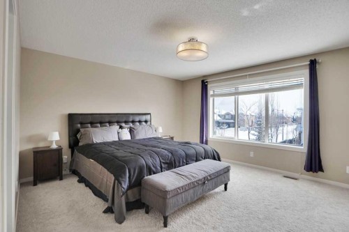 2 Aspen Summit Mount Sw, Calgary, AB - Indoor Photo Showing Bedroom