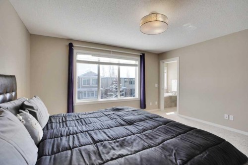 2 Aspen Summit Mount Sw, Calgary, AB - Indoor Photo Showing Bedroom