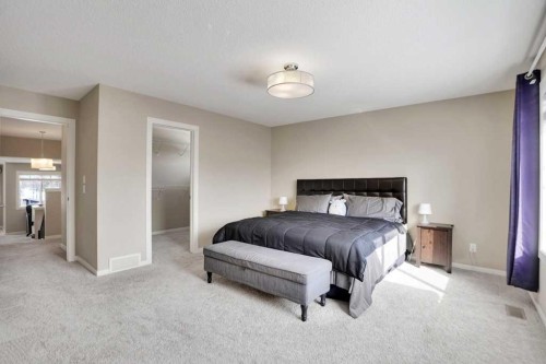 2 Aspen Summit Mount Sw, Calgary, AB - Indoor Photo Showing Bedroom