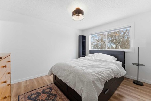 8119 Ranchview Drive Nw, Calgary, AB - Indoor Photo Showing Bedroom
