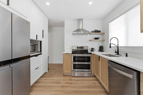 8119 Ranchview Drive Nw, Calgary, AB - Indoor Photo Showing Kitchen With Stainless Steel Kitchen With Upgraded Kitchen