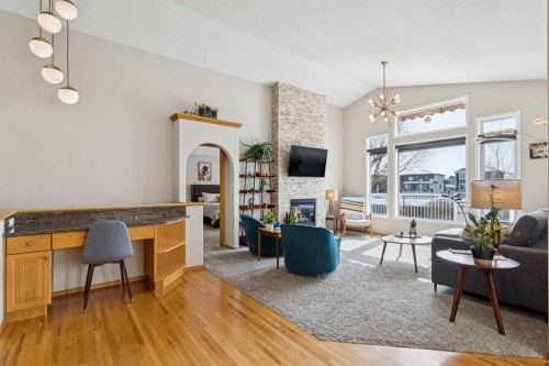 113 Westchester Way, Chestermere, AB - Indoor Photo Showing Living Room With Fireplace