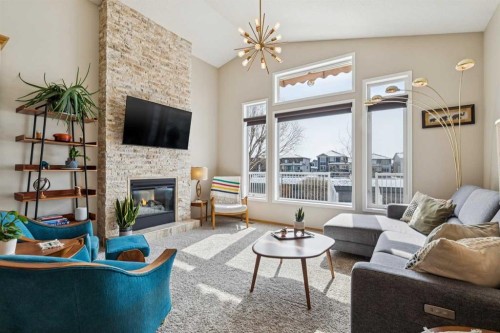 113 Westchester Way, Chestermere, AB - Indoor Photo Showing Living Room With Fireplace