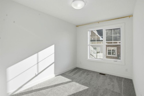 812 Cranbrook Walk Se, Calgary, AB - Indoor Photo Showing Other Room