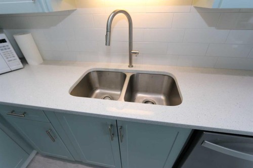 6719 Coach Hill Road Sw, Calgary, AB - Indoor Photo Showing Kitchen With Double Sink