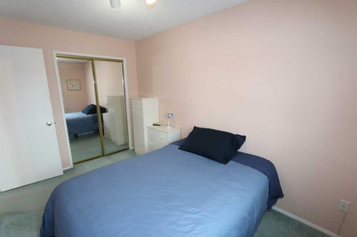 6719 Coach Hill Road Sw, Calgary, AB - Indoor Photo Showing Bedroom