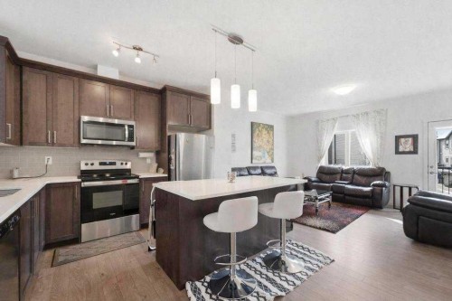 148 Legacy Point Se, Calgary, AB - Indoor Photo Showing Kitchen With Stainless Steel Kitchen With Upgraded Kitchen