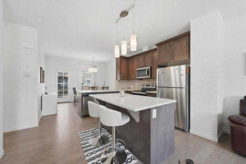 148 Legacy Point Se, Calgary, AB - Indoor Photo Showing Kitchen With Stainless Steel Kitchen With Upgraded Kitchen