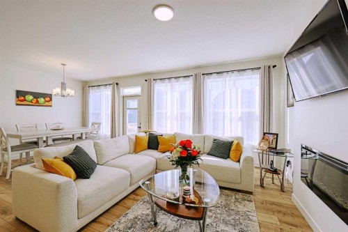 25 Belmont Green Sw, Calgary, AB - Indoor Photo Showing Living Room