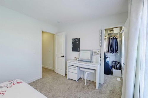 25 Belmont Green Sw, Calgary, AB - Indoor Photo Showing Bedroom