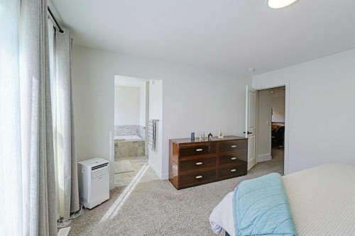 25 Belmont Green Sw, Calgary, AB - Indoor Photo Showing Bedroom