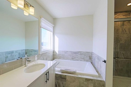 25 Belmont Green Sw, Calgary, AB - Indoor Photo Showing Bathroom