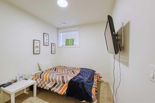 25 Belmont Green Sw, Calgary, AB - Indoor Photo Showing Bedroom