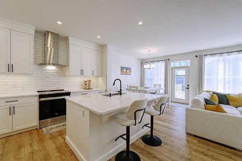 25 Belmont Green Sw, Calgary, AB - Indoor Photo Showing Kitchen With Upgraded Kitchen