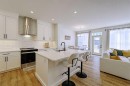 25 Belmont Green Sw, Calgary, AB  - Indoor Photo Showing Kitchen With Upgraded Kitchen 