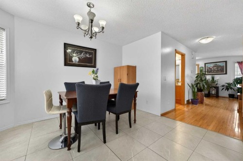 14 Hidden Ranch Hill Nw, Calgary, AB - Indoor Photo Showing Dining Room