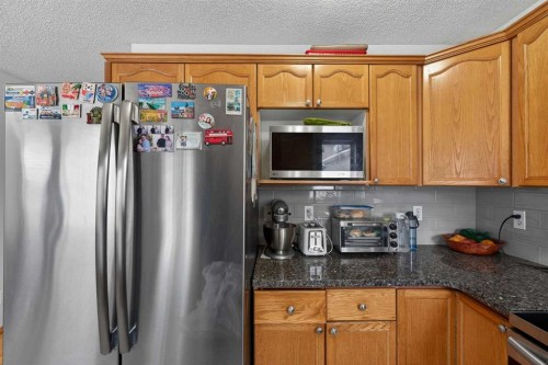 14 Hidden Ranch Hill Nw, Calgary, AB - Indoor Photo Showing Kitchen With Stainless Steel Kitchen