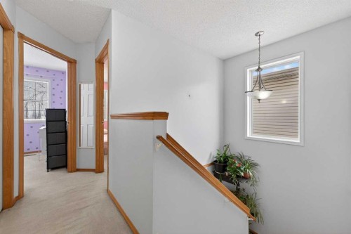 14 Hidden Ranch Hill Nw, Calgary, AB - Indoor Photo Showing Other Room