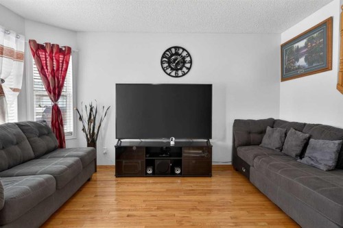 14 Hidden Ranch Hill Nw, Calgary, AB - Indoor Photo Showing Living Room
