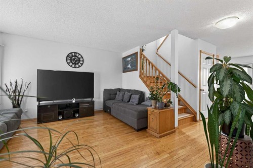 14 Hidden Ranch Hill Nw, Calgary, AB - Indoor Photo Showing Living Room