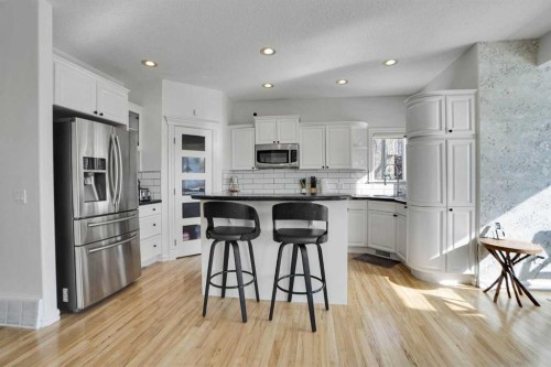 6 Strathridge Way Sw, Calgary, AB - Indoor Photo Showing Kitchen With Upgraded Kitchen