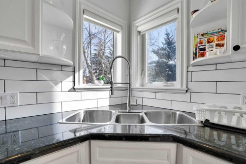 6 Strathridge Way Sw, Calgary, AB - Indoor Photo Showing Kitchen With Double Sink
