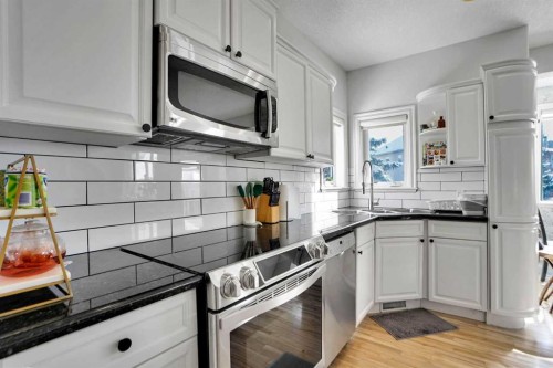 6 Strathridge Way Sw, Calgary, AB - Indoor Photo Showing Kitchen With Upgraded Kitchen