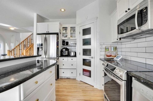 6 Strathridge Way Sw, Calgary, AB - Indoor Photo Showing Kitchen With Upgraded Kitchen