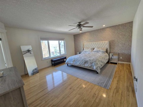 6 Strathridge Way Sw, Calgary, AB - Indoor Photo Showing Bedroom
