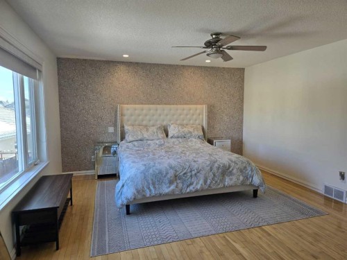 6 Strathridge Way Sw, Calgary, AB - Indoor Photo Showing Bedroom