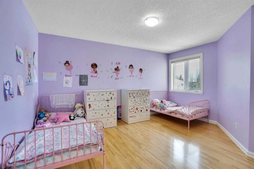6 Strathridge Way Sw, Calgary, AB - Indoor Photo Showing Bedroom