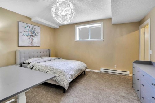 6 Strathridge Way Sw, Calgary, AB - Indoor Photo Showing Bedroom