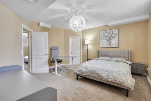 6 Strathridge Way Sw, Calgary, AB - Indoor Photo Showing Bedroom