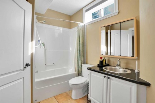 6 Strathridge Way Sw, Calgary, AB - Indoor Photo Showing Bathroom
