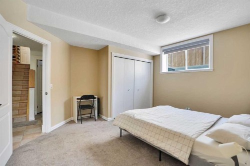 6 Strathridge Way Sw, Calgary, AB - Indoor Photo Showing Bedroom