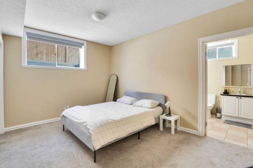 6 Strathridge Way Sw, Calgary, AB - Indoor Photo Showing Bedroom