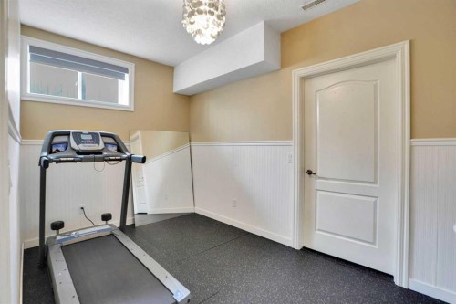 6 Strathridge Way Sw, Calgary, AB - Indoor Photo Showing Gym Room