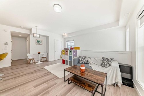 44 Spring Creek Common Sw, Calgary, AB - Indoor Photo Showing Living Room