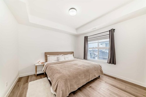 44 Spring Creek Common Sw, Calgary, AB - Indoor Photo Showing Bedroom