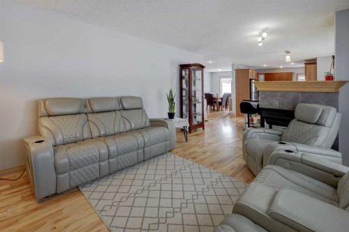 115 Rockledge Terrace Nw, Calgary, AB - Indoor Photo Showing Living Room With Fireplace