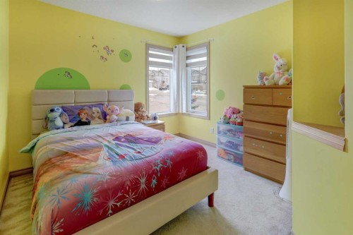 115 Rockledge Terrace Nw, Calgary, AB - Indoor Photo Showing Bedroom