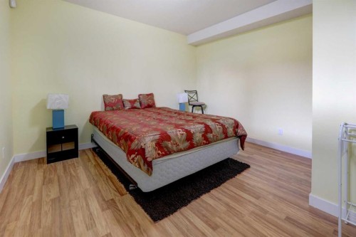 115 Rockledge Terrace Nw, Calgary, AB - Indoor Photo Showing Bedroom