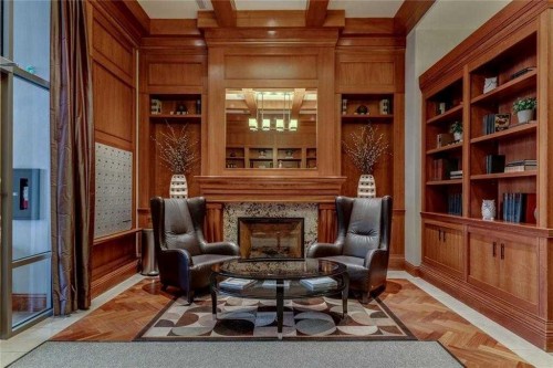 204-701 3 Avenue Sw, Calgary, AB - Indoor With Fireplace