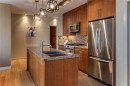 204-701 3 Avenue Sw, Calgary, AB  - Indoor Photo Showing Kitchen With Stainless Steel Kitchen With Double Sink With Upgraded Kitchen 