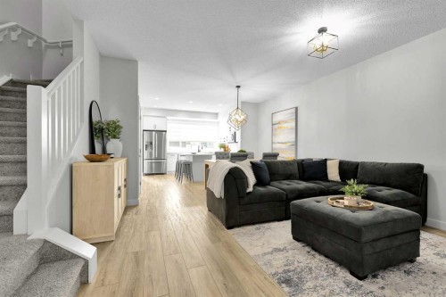 125 Emberside Hollow, Cochrane, AB - Indoor Photo Showing Living Room