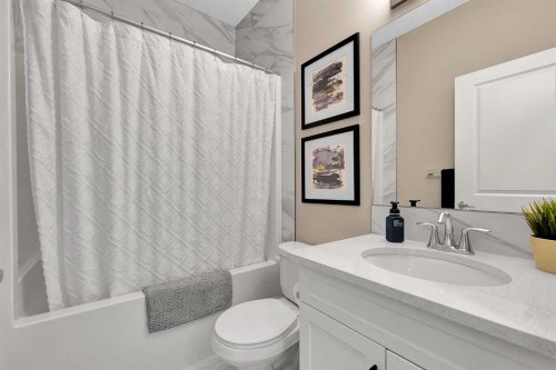 125 Emberside Hollow, Cochrane, AB - Indoor Photo Showing Bathroom