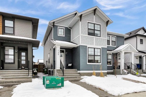 125 Emberside Hollow, Cochrane, AB - Outdoor With Facade
