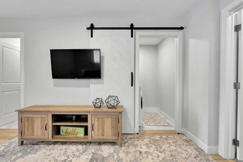 125 Emberside Hollow, Cochrane, AB - Indoor Photo Showing Other Room